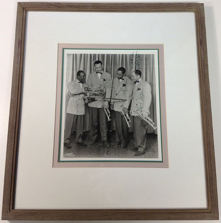 Item #122643 Framed Signed Photograph of Lionel Hampton's brass section. Lionel HAMPTON.