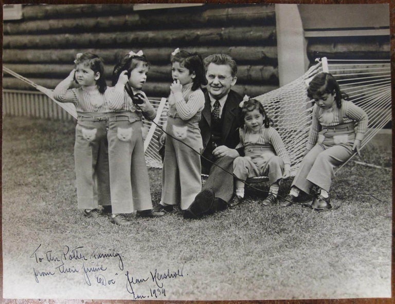 Item #122783 Inscribed Photograph with the Dionne quintuplets. Jean HERSHOLT, 1886 - 1956.