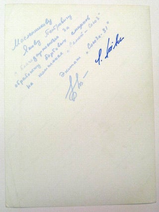 Autographed color crew photo signed on verso