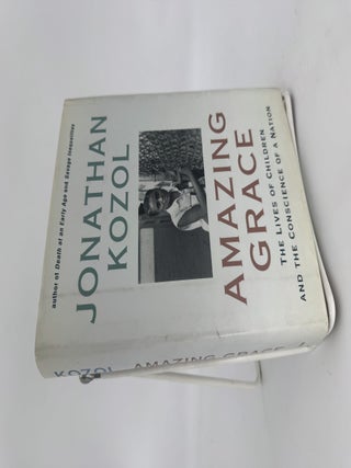 Item #256271 Amazing Grace: The Lives of Children and the Conscience of a Nation. Jonathan KOZOL