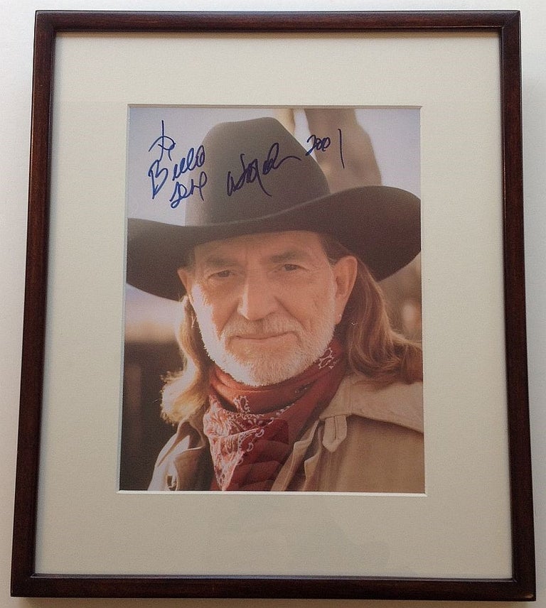 Item #261475 Framed Inscribed Photograph. Willie NELSON, 1933 -.