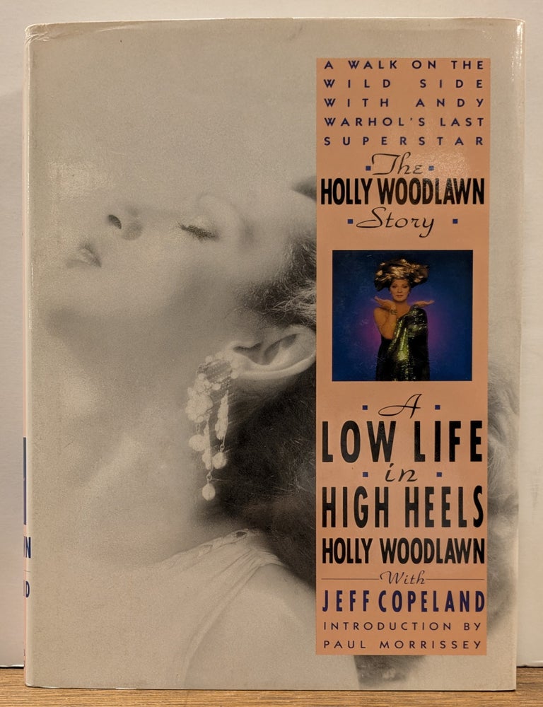 Item #338685 A Low Life in High Heels: The Holly Woodlawn Story. Holly WOODLAWN, Jeffrey COPELAND.
